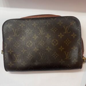 Louis Vuitton Monogram Canvas Toiletry Pouch clutch in Brown
